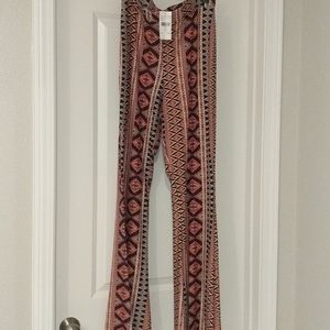 Fashion Nova pink multi print flare pants